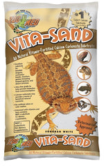 Zoo Med Vita-Sand Sonoran White, envase práctico para hábitats desérticos.
